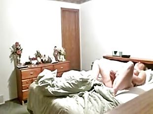My chubby mum caucht masturbating on bed by hidden cam